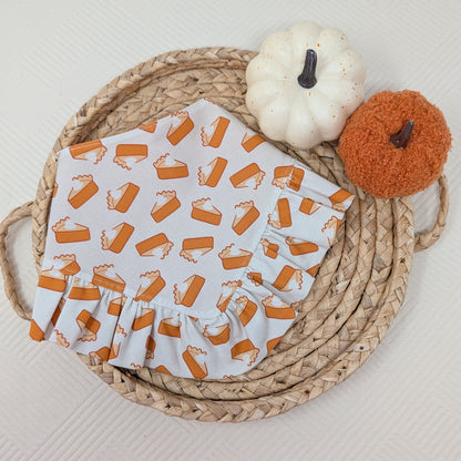 dog bandana pumpkin pie pattern on a woven tray with pumpkins